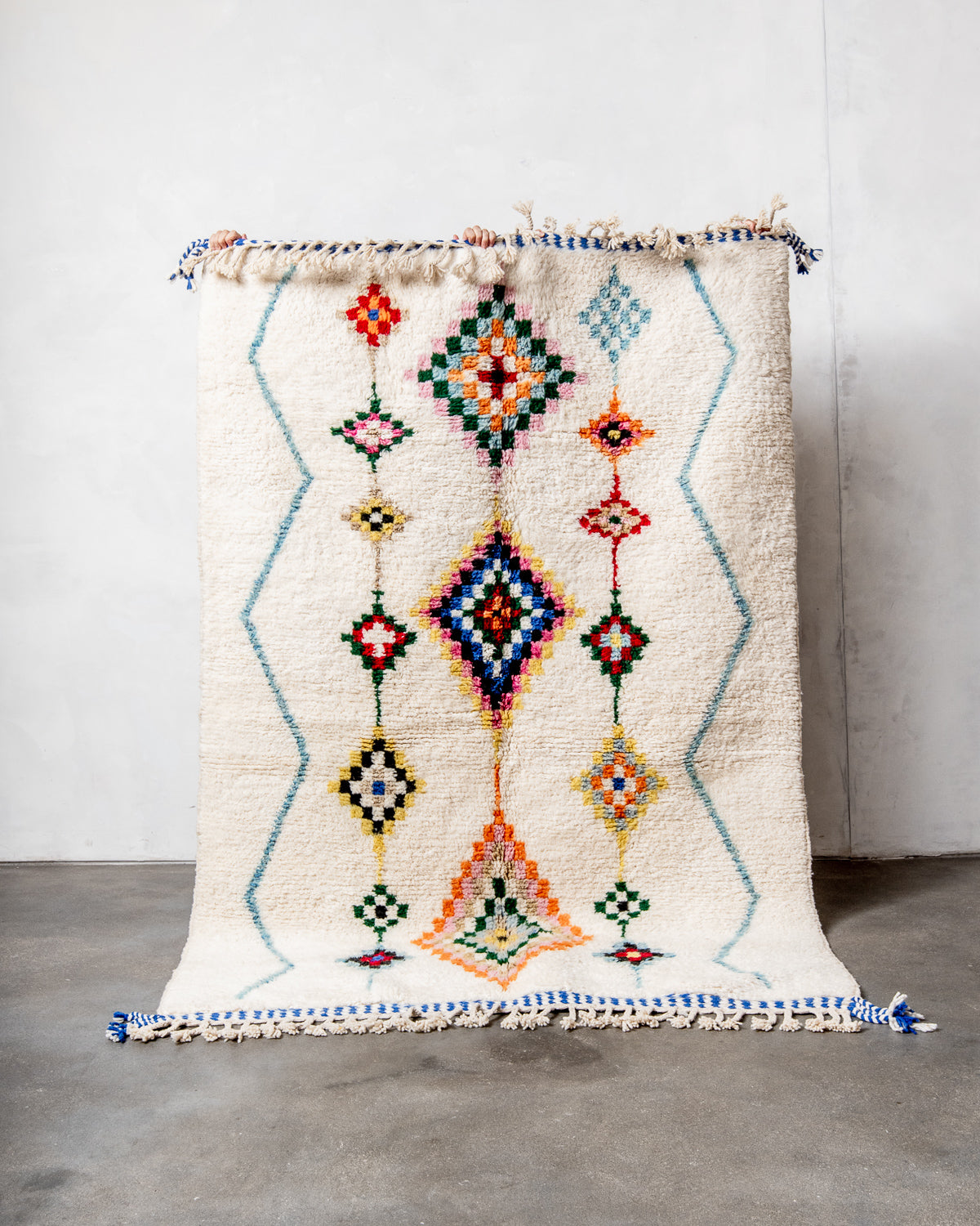 Modern, designer, handcrafted Berber rug from Morocco. Beniourain carpet with beautiful colours and patterns and fluffy wool texture.